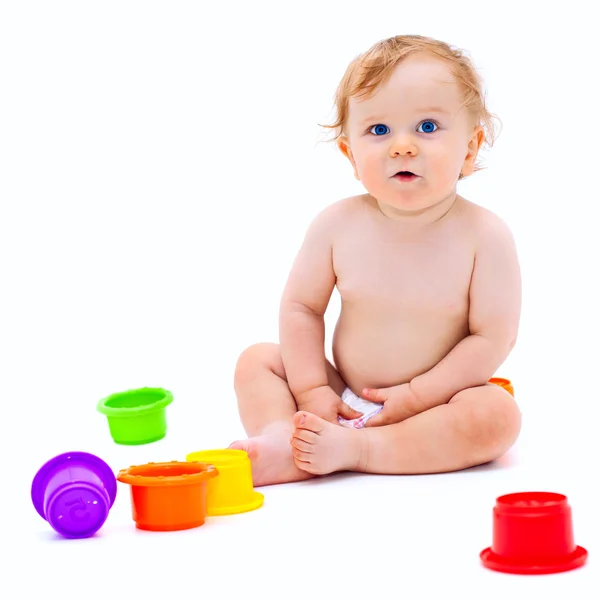 Niedliche kleine Junge mit Spielzeug — Stockfoto