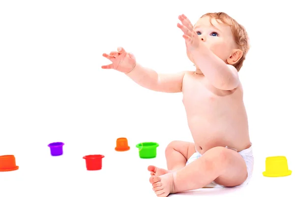 Cute infant boy with toys — Stock Photo, Image