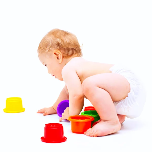 Carino neonato ragazzo con giocattoli — Foto Stock