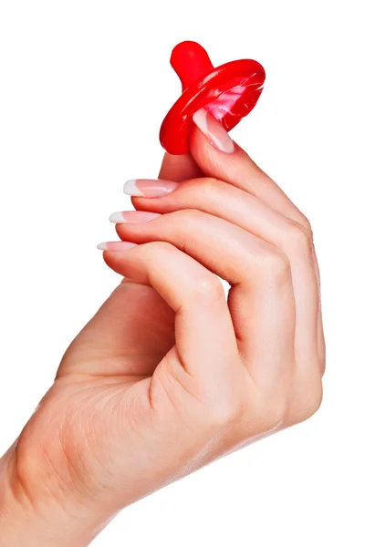 Hand holding a condom — Stock Photo, Image