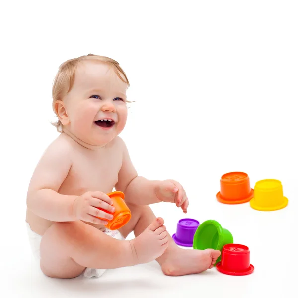 Carino neonato ragazzo con giocattoli — Foto Stock
