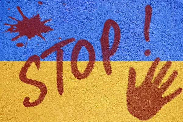 Ukraine flag painted on old concrete wall with STOP inscription — Stock Photo, Image