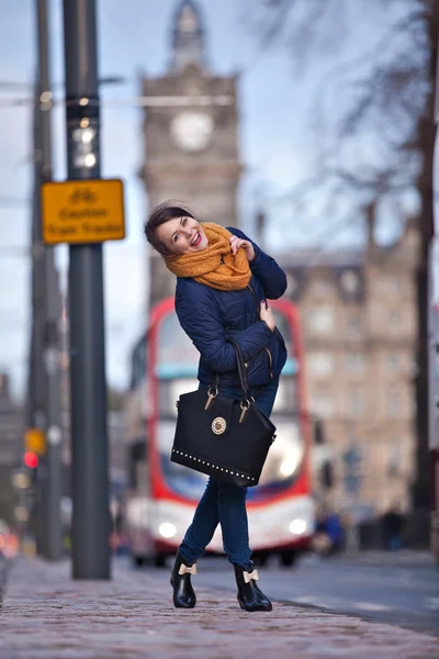 Pretty girl walking on the road — Stock Photo, Image