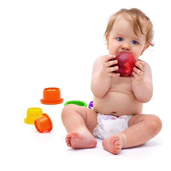 Cute infant boy with apple — Stock Photo, Image