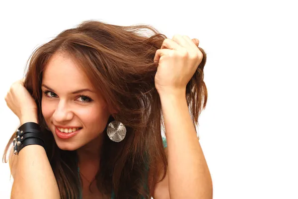 Joven chica sonriente sobre un fondo blanco —  Fotos de Stock