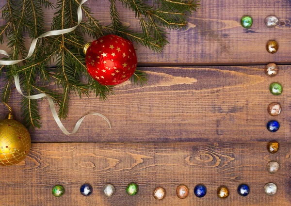 Marco de Navidad sobre fondo de madera — Foto de Stock