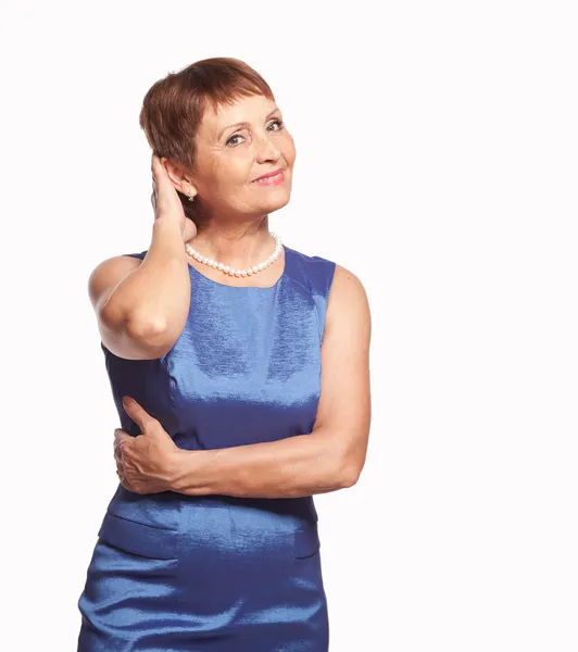 Aantrekkelijke vrouw 50 jaar in blauwe jurk — Stockfoto