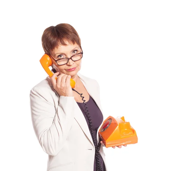 Séduisante femme 50 ans avec téléphone vintage — Photo