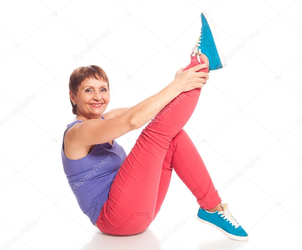 attractive woman 50 years doing fitness