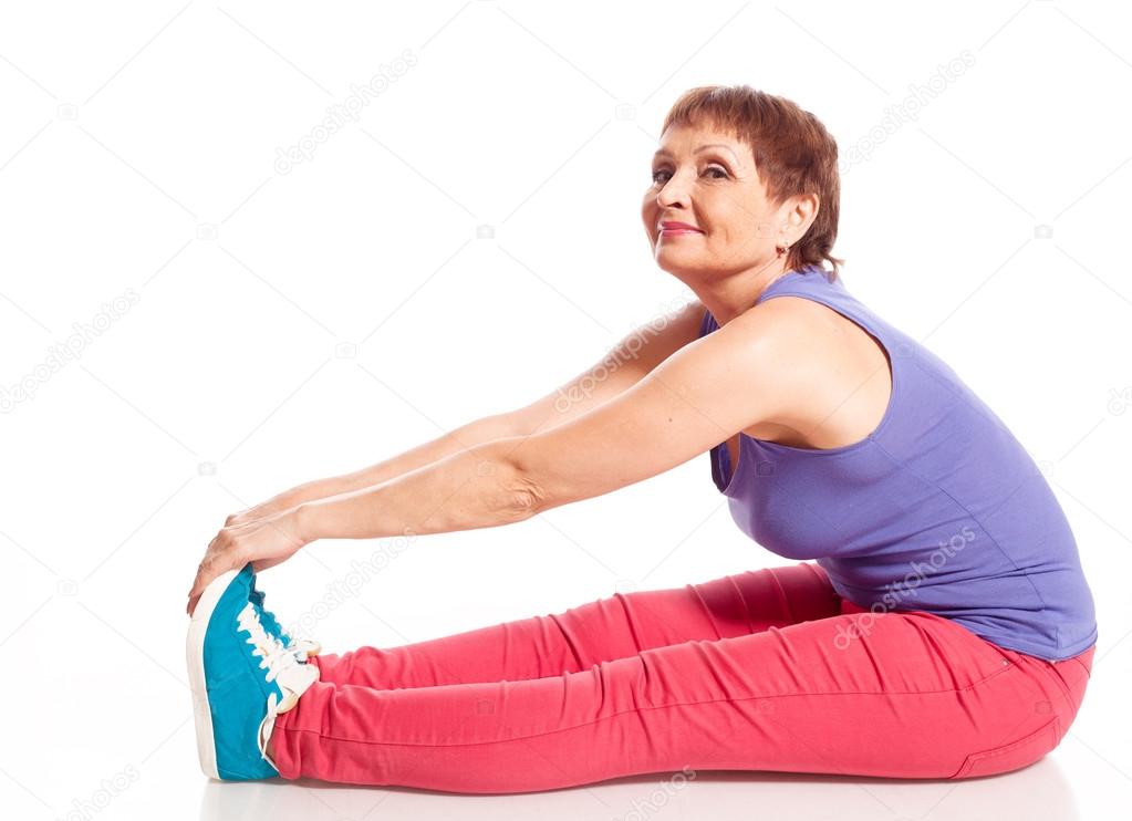 attractive woman 50 years doing fitness