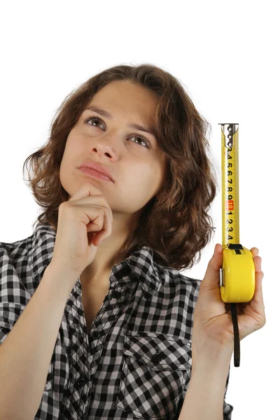 Young woman with a tape measure — Stock Photo, Image