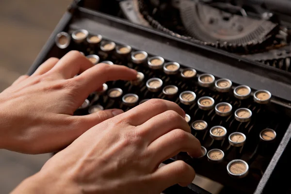 Human hand prints on retro typewriter. — Stock Photo, Image