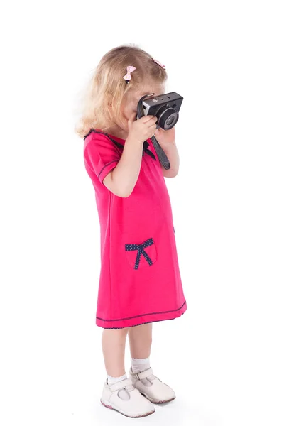 Curly-haired little girl with vintage camera isolated — Stock Photo, Image