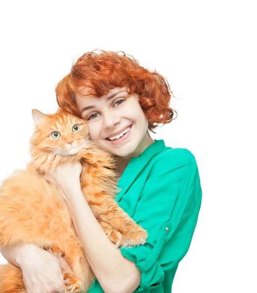 Curly red-haired girl with a red cat isolated on white — Stock Photo, Image
