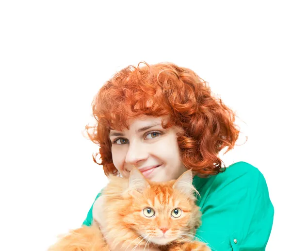 Curly red-haired girl with a red cat isolated on white — Stock Photo, Image