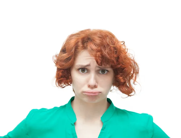 Emotional red-haired woman in doubt, isolated on white backgroun — Stock Photo, Image