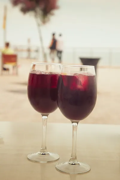 Sangria in two glasses on a table in cafe, instagram effect — Stock Photo, Image