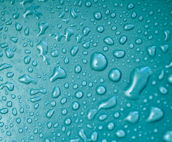 Gocce d'acqua su vetro, sfocato, sfondo e texture — Foto Stock