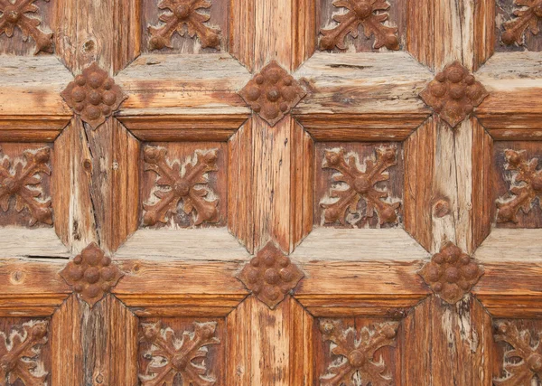 Vintage wooden door, medieval architecture. Part of a door of ol — Stock Photo, Image