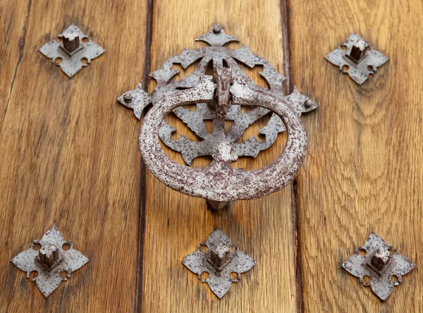 Part of a door of old castle. Wood and metal — Stock Photo, Image