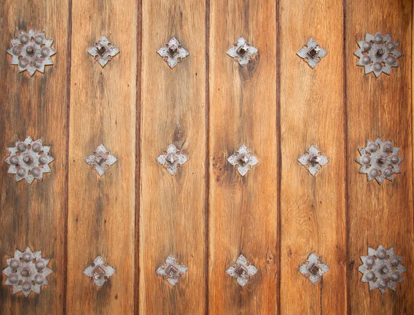 Porta de madeira vintage, arquitetura medieval. Parte de uma porta de ol — Fotografia de Stock