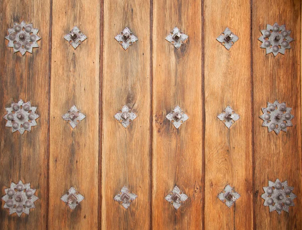 Vintage wooden door, medieval architecture. Part of a door of ol — Stock Photo, Image