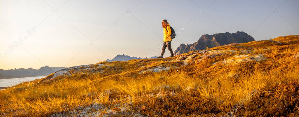 Traveler Woman trail running outdoor in Norway mountains Travel healthy Lifestyle concept adventure wild nature