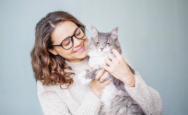 Young Cheerful Curly Girl Woman Glasses Holding Beautiful Gray Fluffy — Stockfoto