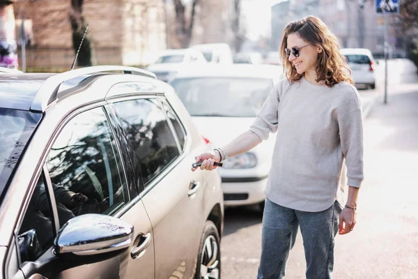 Happy Cheerful Young Woman Driver Opens Her Car Remote Key — Stockfoto