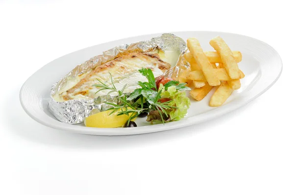 French fries and fish in foil — Stock Photo, Image