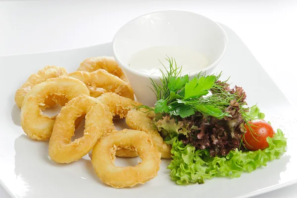 Squid rings with vegetables and salad — Stock Photo, Image