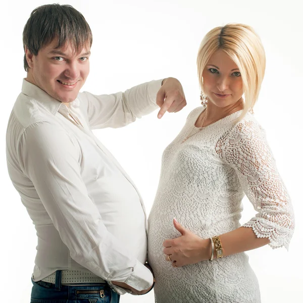 Pregnant woman with her husband on white — Stock Photo, Image