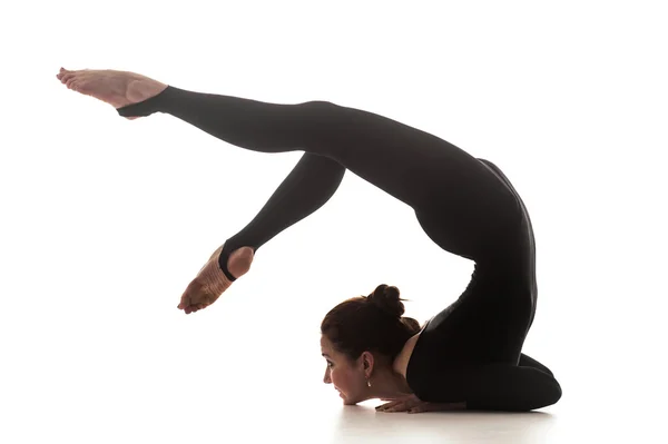 Woman dancing acrobatical dance. Isolated on white — Stock Photo, Image