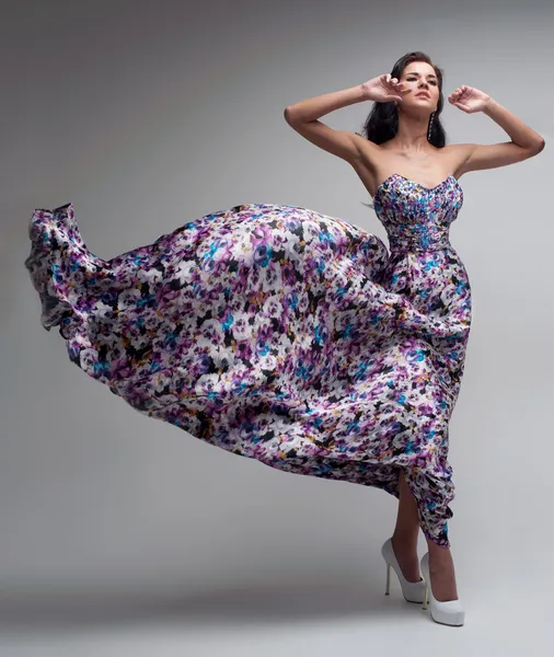 Woman in floral dress — Stock Photo, Image