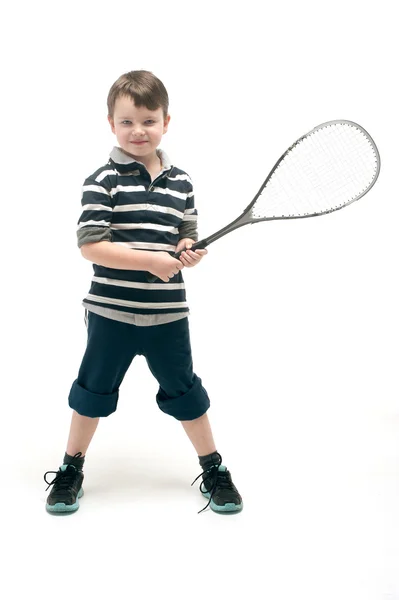 Menino com raquete de tênis — Fotografia de Stock