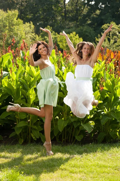 Two girls in summer garden — Stock Photo, Image