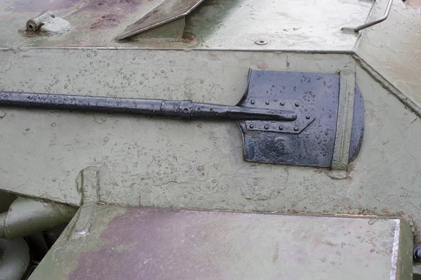 Metal Army shovel attached to tank — Stock Photo, Image
