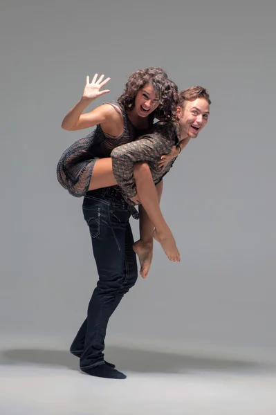 Playful fashionable young couple — Stock Photo, Image