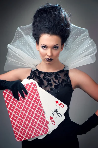 Perfect young woman with playing cards — Stock Photo, Image