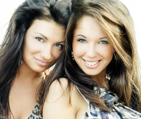 Two smiling attractive girl friends — Stock Photo, Image