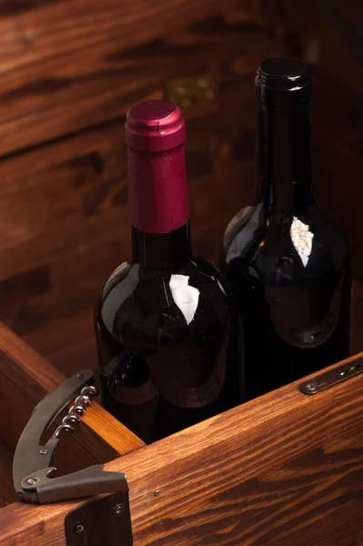 Wood case with bottles of wine — Stock Photo, Image