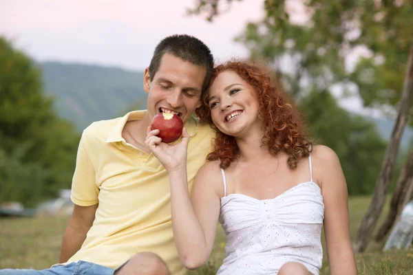 Couple with fruit — Stock Photo, Image