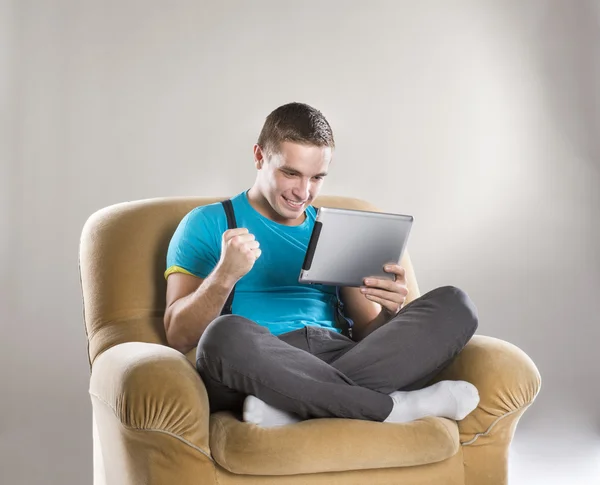 Young man with tablet — Stock Photo, Image