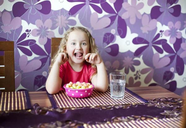 Little girl is eating — Stock Photo, Image