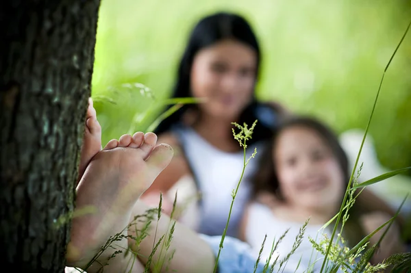 Mother and daughter in the park — Stock Photo, Image