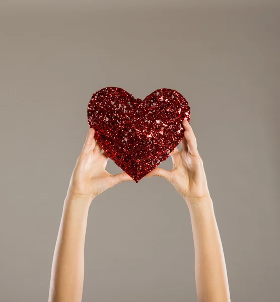 Woman with red heart — Stock Photo, Image