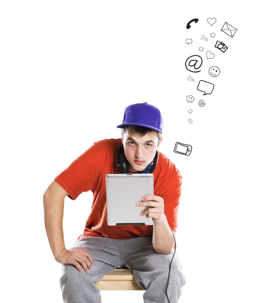 Young man with tablet Stock Picture