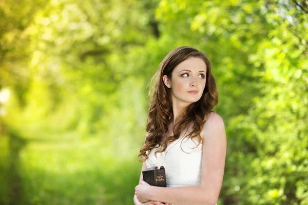 Beautiful woman with book — Stock Photo, Image