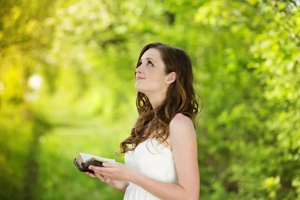 Beautiful woman with book — Stock Photo, Image