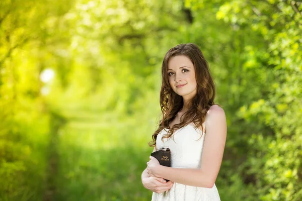 Beautiful woman with book — Stock Photo, Image